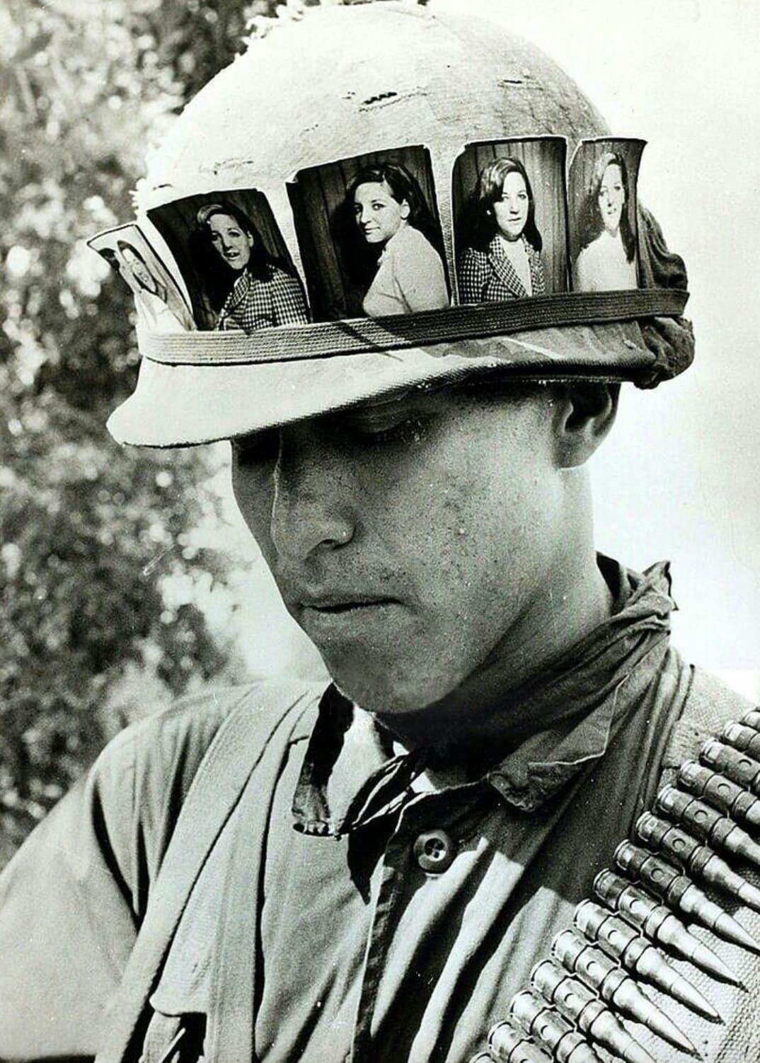 soldier with picture of his girlfriend on helmet